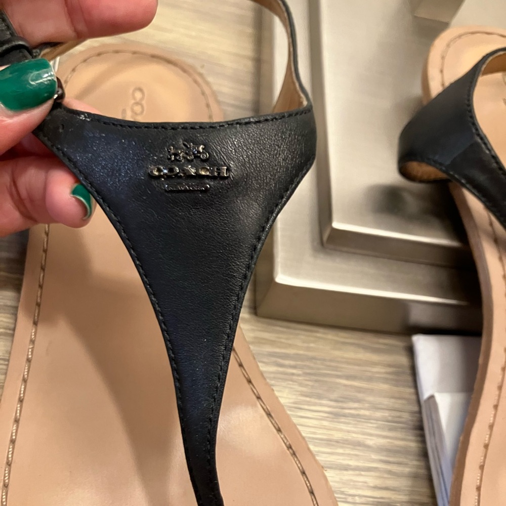 Used but in great condition coach leather black thong sandal.